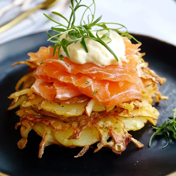 A stack of food on a plate.