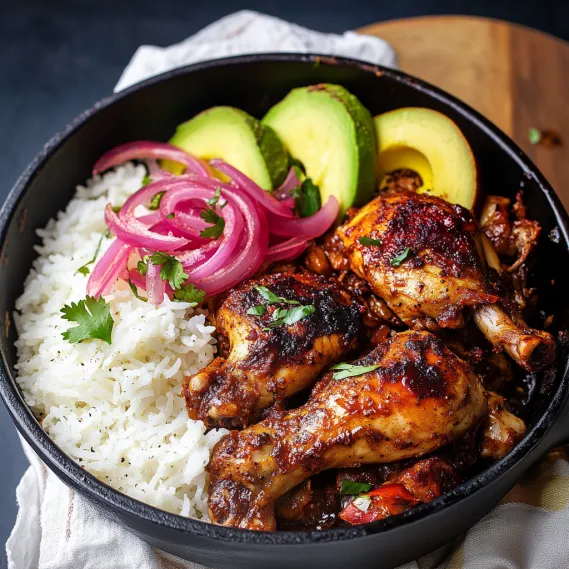 A bowl of food with rice, chicken, and avocado.