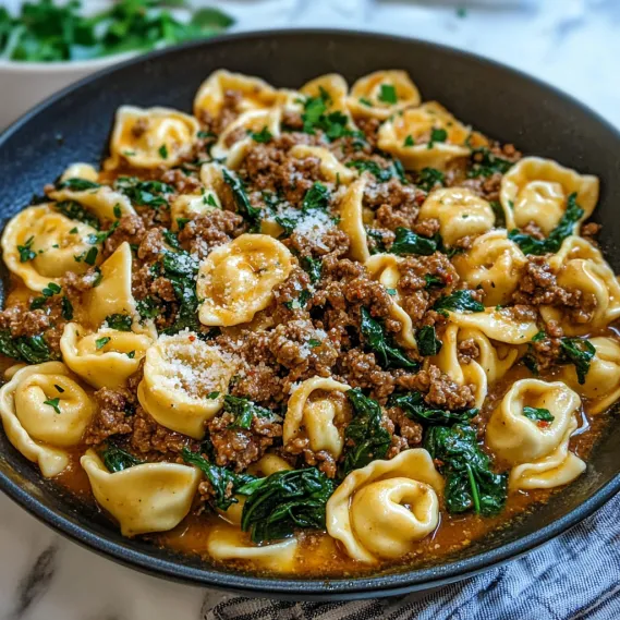 Pasta bowl with meat and veggies.