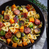 A cozy bowl of pasta, squash, and sausage.